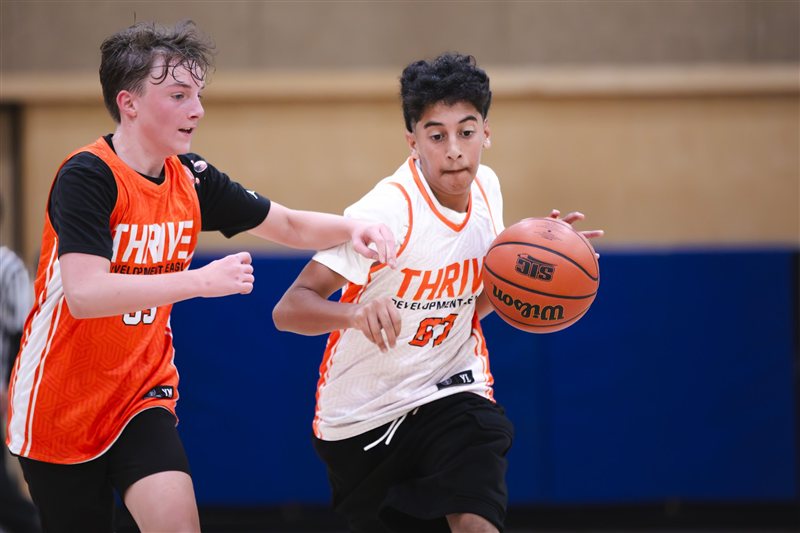 Basketball player protecting the ball from an opponent